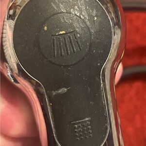 Silver sink faucet with sprayer